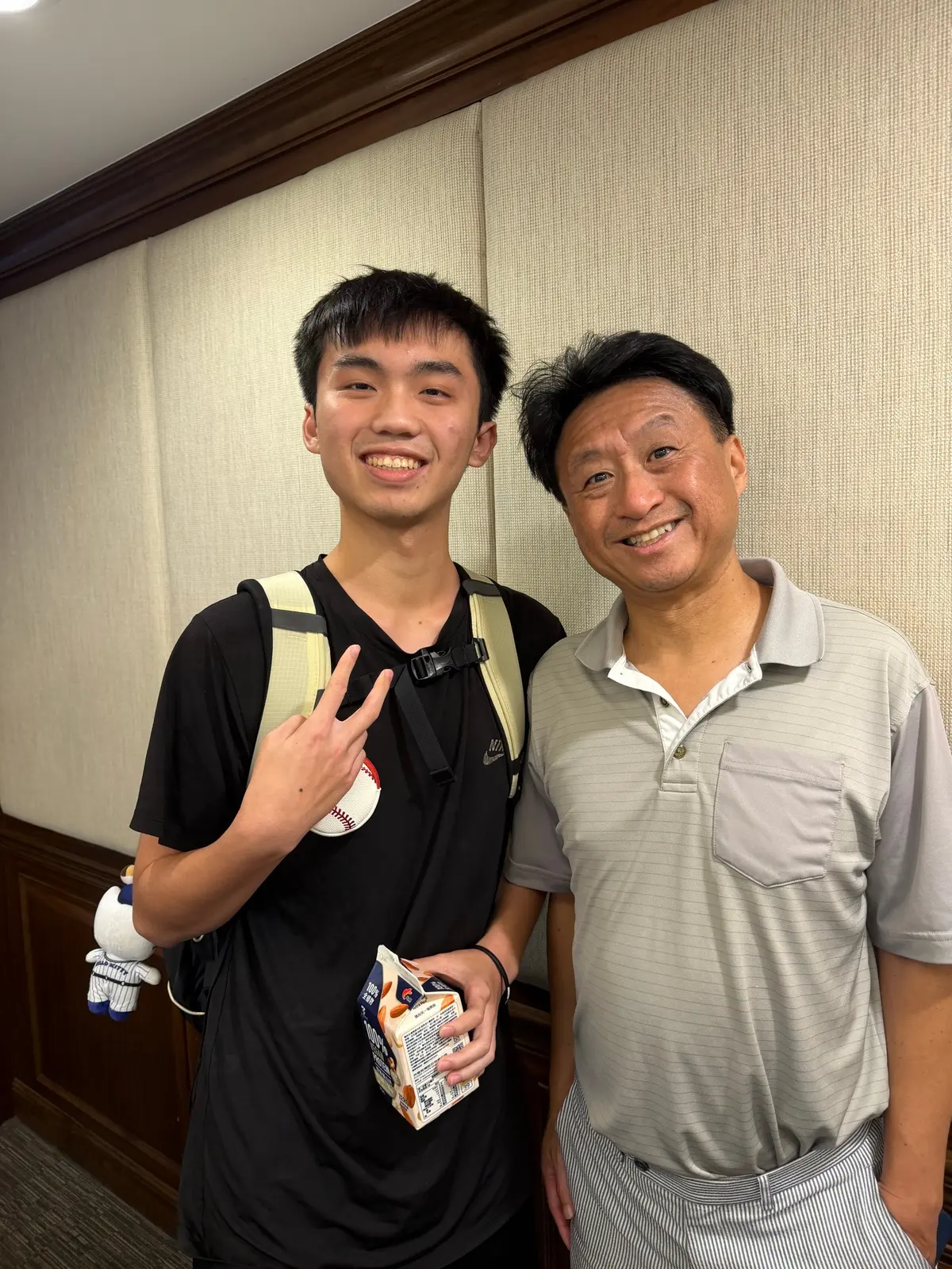 Alen Hsiao with another person, smiling.